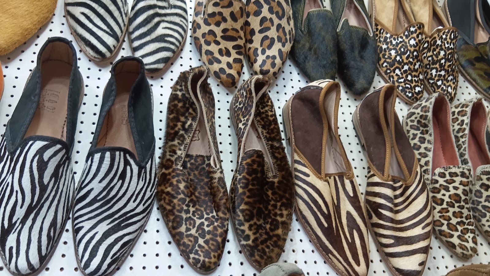 Hair-on-hide loafers in zebra and leopard patterns